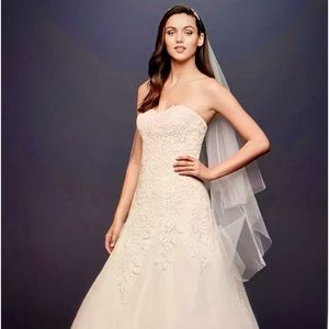 David’s Bridal Collection- Soft Tulle Wedding Dress with leaf lace applique.
